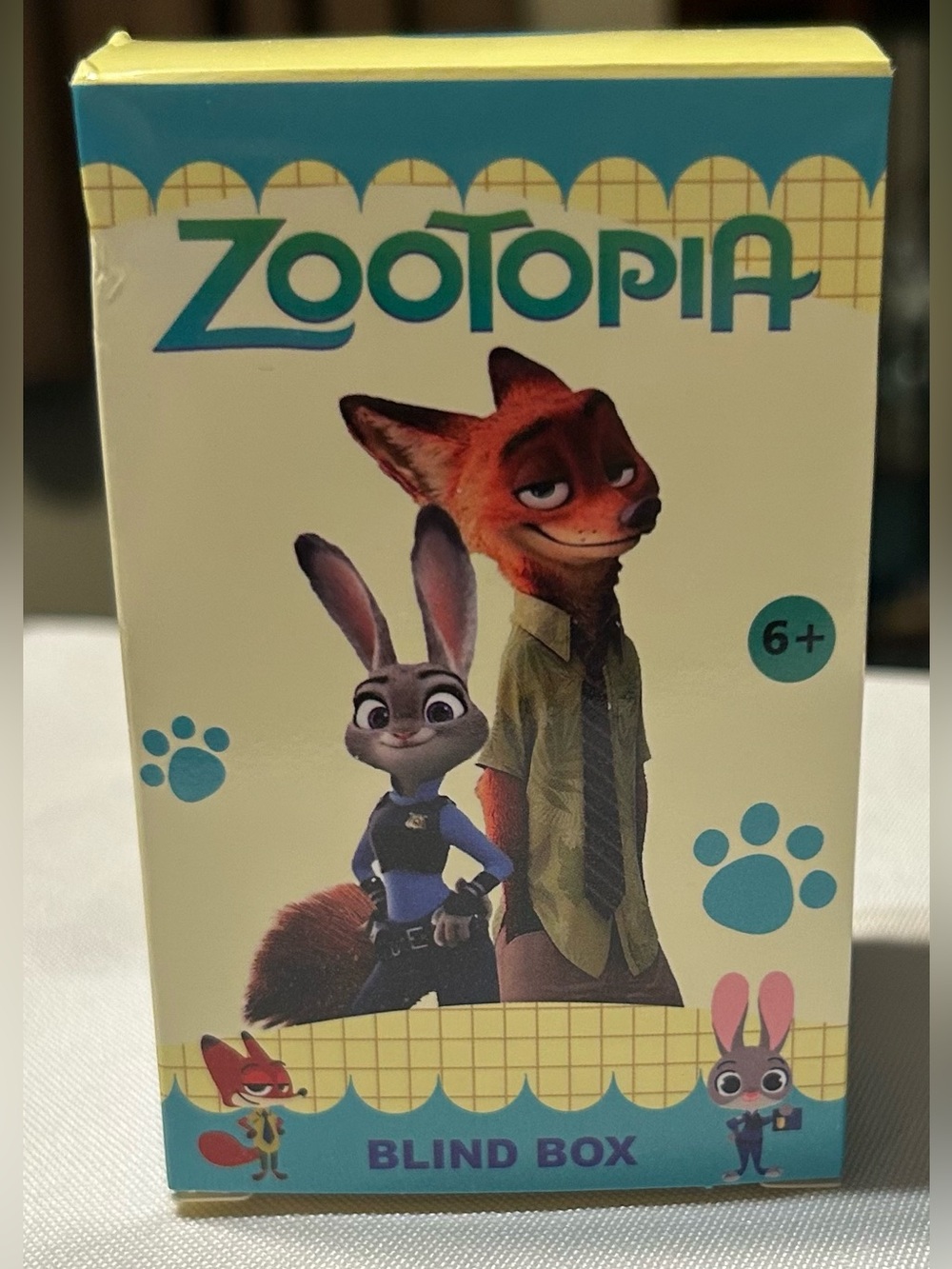 Zootopia Blind Box Collectible Figure - Yellow with Teal & Blue Accents
